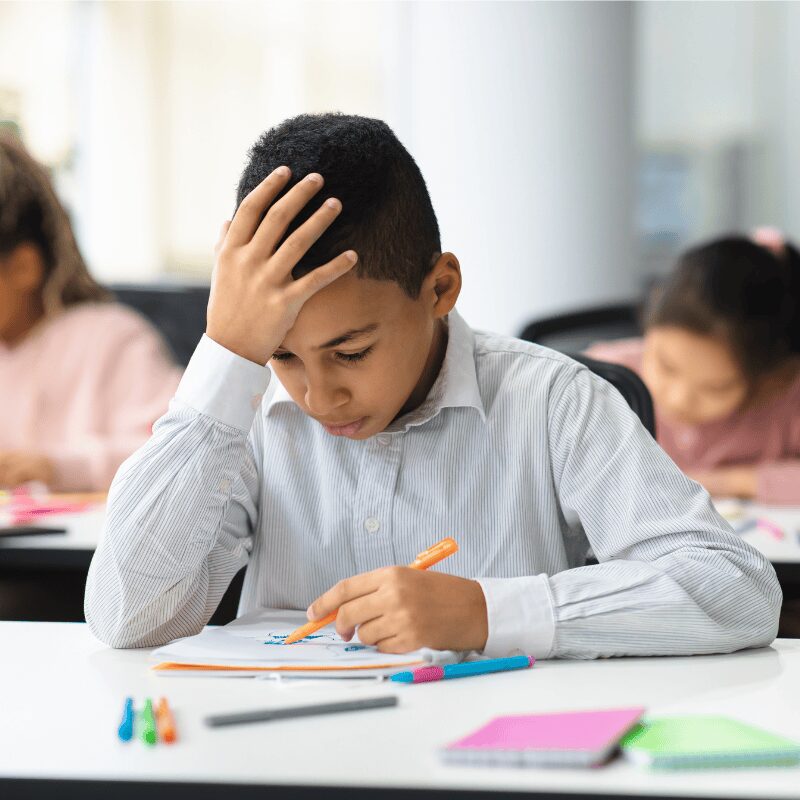 kid student struggling with class work